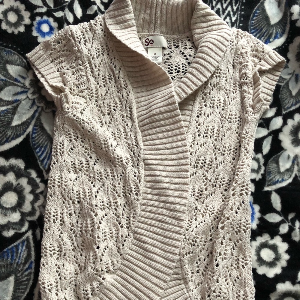 Girl’s beige knit sweater
